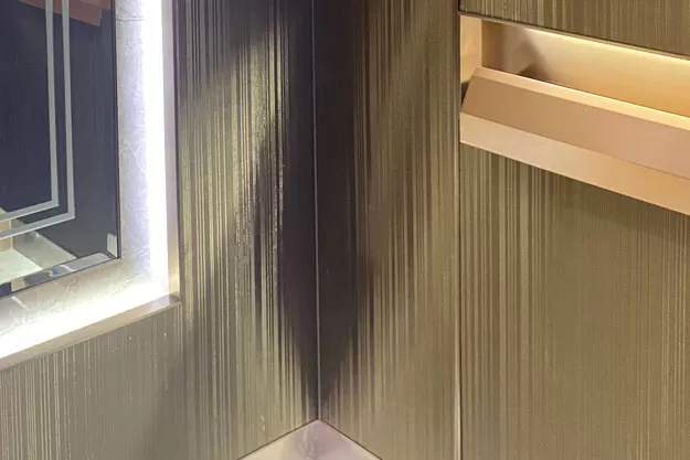 Woven metal interior in elevator design
